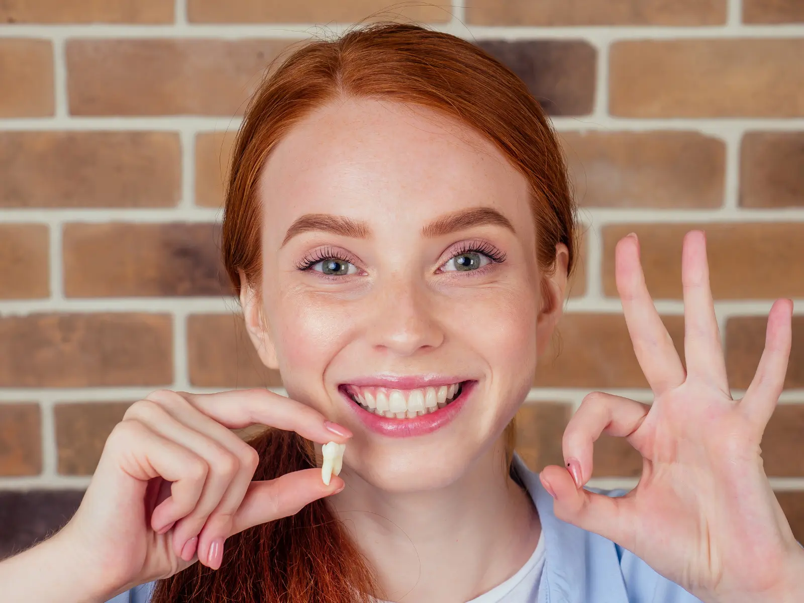 patient after having their wisdom tooth removed in coral gables, fl